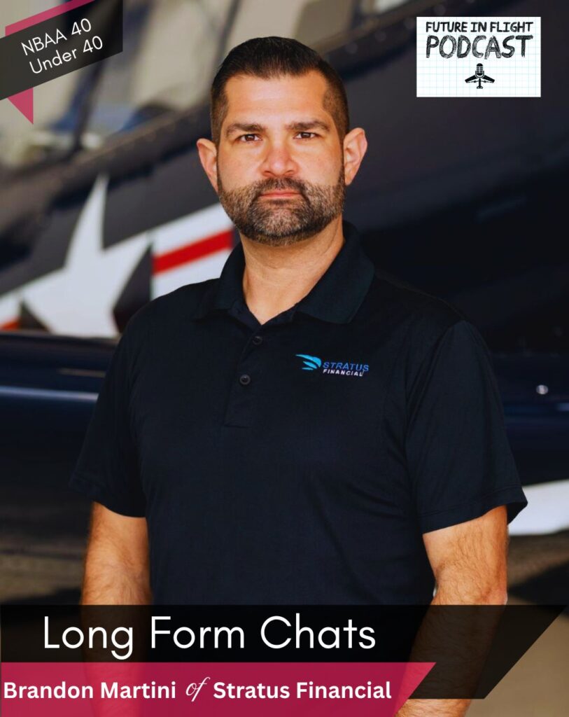 Brandon Martini, co_CEO of Stratus Financial stands in front of a vintage warbird.
