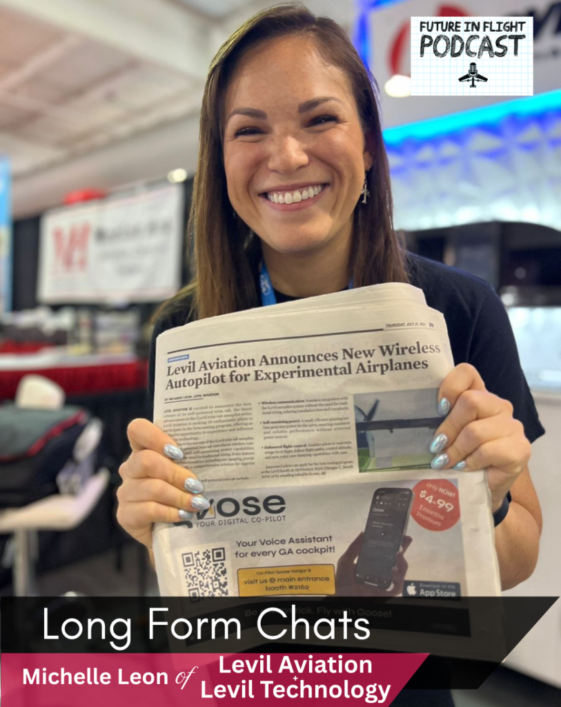 Michelle Leon stands proudly displaying a newspaper article about Levil Aviation's success.